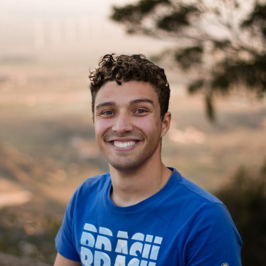 smiling men in blue shirt