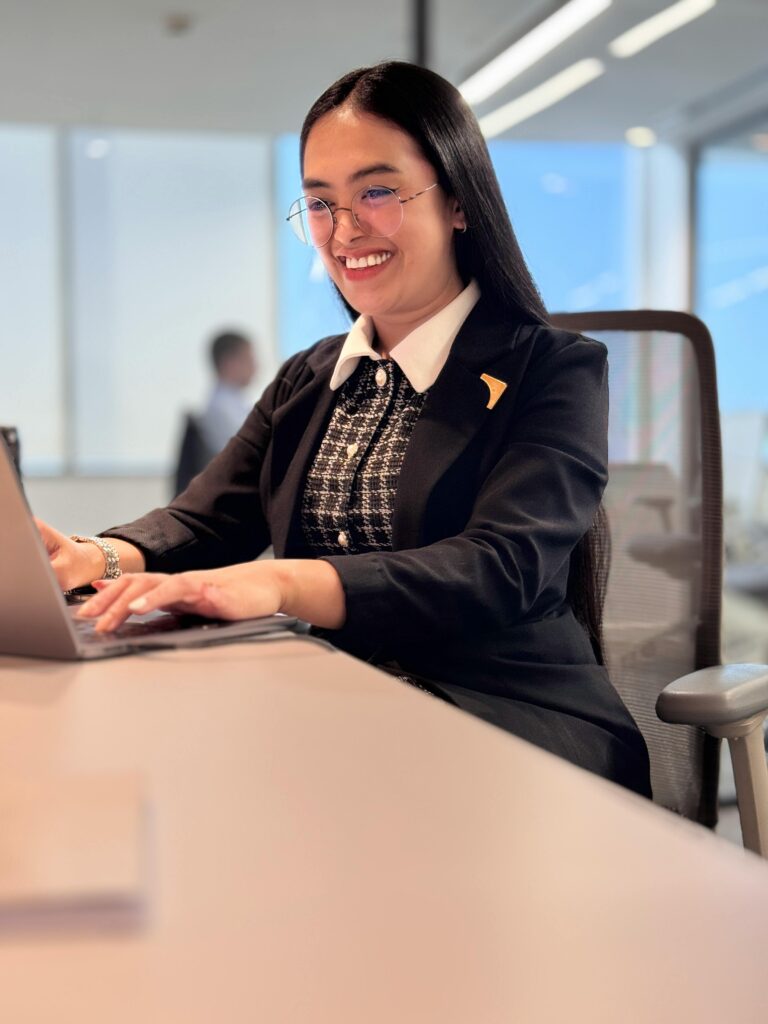 big teeth smiling lady in office