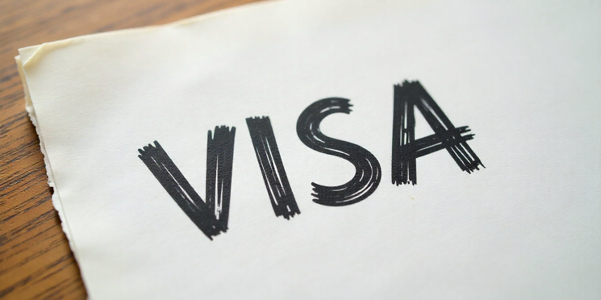 visa written on paper